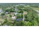An aerial view of a neighborhood showing the home's location and proximity to a lake at 1130 Roxboro Rd, Longwood, FL 32750