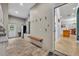 Spacious mud room featuring a built-in bench and convenient hooks at 1130 Roxboro Rd, Longwood, FL 32750