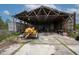 Interior view of the barn and tractor at 11320 Montevista Rd, Clermont, FL 34711