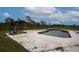 Outdoor pool area with a seating pavilion at 11320 Montevista Rd, Clermont, FL 34711