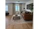 Cozy living room showcasing a comfortable seating arrangement and stylish decor at 12850 Lexington Summit St, Orlando, FL 32828