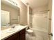 Full bathroom featuring a shower and tub combo, tile flooring, and a vanity sink at 133 Grove Branch Rd, Winter Haven, FL 33880