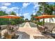 Enjoyable bocce ball court, surrounded by seating and tropical landscaping for leisure time with friends and Gathering at 1335 Zeek Ridge St, Clermont, FL 34715