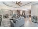 Spacious living area with tile floors, open to the kitchen and dining, providing ample seating at 1335 Zeek Ridge St, Clermont, FL 34715