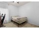 Simple bedroom with carpet floors, a ceiling fan, and a bed frame at 14556 Unbridled Dr, Orlando, FL 32826