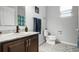 Bathroom features a marble countertop, bronze fixtures, and a tiled floor at 14722 Porter Rd, Winter Garden, FL 34787