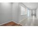 Bright hallway features tile floors and natural light streaming through the large window, leading to the front door at 14722 Porter Rd, Winter Garden, FL 34787