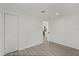 Bedroom featuring hardwood floors, closet, and doorway to the kitchen at 151 Naranja Rd, Debary, FL 32713