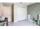 Bedroom with a custom painted accent wall and ample storage at 16369 Yelloweyed Dr, Clermont, FL 34714