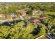 Aerial view of home in a desirable neighborhood with mature landscaping at 189 Hammock Oak Cir, Debary, FL 32713
