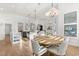 Bright breakfast nook adjacent to the kitchen, offering a view of the living spaces at 189 Hammock Oak Cir, Debary, FL 32713
