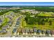Aerial view focusing on select homes in a well-planned community near a school and baseball field at 1910 Donahue Dr, Ocoee, FL 34761
