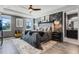 Charming main bedroom suite with decorative wall, tray ceiling, and ensuite bathroom access at 1910 Donahue Dr, Ocoee, FL 34761