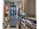 Organized walk-in closet features clothing and shelves with storage baskets at 1910 Donahue Dr, Ocoee, FL 34761