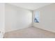 Neutral bedroom with carpet, window view, and white painted walls at 19319 Briercrest Trl, Orlando, FL 32833