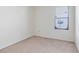 Cozy bedroom with carpet, window view, and white painted walls at 19319 Briercrest Trl, Orlando, FL 32833