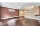 Bright living room featuring wood floors, neutral walls, and a ceiling fan at 1998 Michael Tiago Cir, Maitland, FL 32751