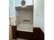 Bathroom featuring a tub with wood paneling and tile surround at 2154 Lake Christie Dr, Orlando, FL 32809