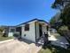 Charming single story home featuring an open porch, convenient driveway, and well maintained landscaping at 2154 Lake Christie Dr, Orlando, FL 32809