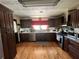 Bright kitchen boasting modern appliances, elegant cabinetry, and hardwood floors at 2154 Lake Christie Dr, Orlando, FL 32809