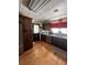 Charming kitchen with wooden cabinets, stainless steel dishwasher, and hardwood flooring at 2154 Lake Christie Dr, Orlando, FL 32809