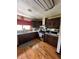 Well-equipped kitchen with stainless steel appliances, wooden cabinets, and modern finishes at 2154 Lake Christie Dr, Orlando, FL 32809