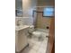 Clean bathroom featuring tiled floors, a stylish vanity, and a shower-tub combination at 275 Virginia Dr, Winter Garden, FL 34787