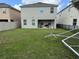 Back yard with green space and partial fencing at 2753 Monticello Way, Kissimmee, FL 34741
