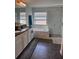 Bright bathroom features double vanity, a garden tub, and glass-enclosed shower for a spa-like experience at 2753 Monticello Way, Kissimmee, FL 34741
