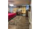 Spacious bedroom with neutral tones, wood floors, an area rug and curtains for an inviting atmosphere at 2753 Monticello Way, Kissimmee, FL 34741
