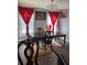 Dining room with a chandelier, an area rug, and a dining table at 2753 Monticello Way, Kissimmee, FL 34741