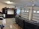 Spacious two-car garage, with ample storage and a cozy sitting area, awaits your personal touch at 2753 Monticello Way, Kissimmee, FL 34741