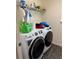 Well-equipped laundry room with modern appliances for easy chores and organization at 2753 Monticello Way, Kissimmee, FL 34741