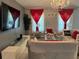 Cozy living room featuring elegant decor and plenty of natural light at 2753 Monticello Way, Kissimmee, FL 34741