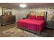 Elegant main bedroom features a luxurious bed, stylish decor, and inviting ambiance at 2753 Monticello Way, Kissimmee, FL 34741