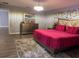 Elegant main bedroom features a luxurious bed, stylish decor, and inviting ambiance at 2753 Monticello Way, Kissimmee, FL 34741