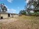 The backyard is spacious with mature trees at 2845 Ellis Ave, Lakeland, FL 33803
