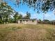 The backyard is spacious and has a wooden fence at 2845 Ellis Ave, Lakeland, FL 33803