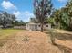 Charming single-story home featuring a well-maintained lawn and inviting blue door at 2845 Ellis Ave, Lakeland, FL 33803