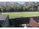 Backyard with a view of the pond and an open patio at 3254 Oak Lake Pl # 137, Winter Park, FL 32792