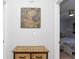 Bedroom with drawers and a view into another room at 3254 Oak Lake Pl # 137, Winter Park, FL 32792