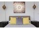 Bedroom decor includes decorative wall art and hanging lights at 3254 Oak Lake Pl # 137, Winter Park, FL 32792