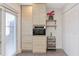 Modern kitchen details with wood-paneled cabinets, built-in oven, and sleek design for functionality at 3254 Oak Lake Pl # 137, Winter Park, FL 32792