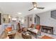 Comfortable living room showcasing seamless flow to the kitchen, modern design, and wood-style flooring at 3254 Oak Lake Pl # 137, Winter Park, FL 32792