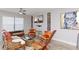 Inviting living room with natural light, unique furnishings, and decorative accents for a cozy atmosphere at 3254 Oak Lake Pl # 137, Winter Park, FL 32792