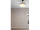 Empty Room with tile floor and fixture light at 3532 Yarian Dr, Haines City, FL 33844
