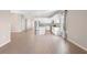 Bright, open-concept kitchen with stainless steel appliances and white cabinetry at 3532 Yarian Dr, Haines City, FL 33844