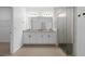 Bright bathroom boasts a granite countertop vanity, walk-in shower, and access to a walk-in closet at 3532 Yarian Dr, Haines City, FL 33844