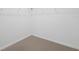 Empty walk-in closet with carpeted floor and wire rack shelving for ample storage at 3532 Yarian Dr, Haines City, FL 33844