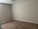 Neutral bedroom with carpeted floors, offering a blank canvas for personalization and comfortable living space at 377 Blue Bayou Dr, Kissimmee, FL 34743